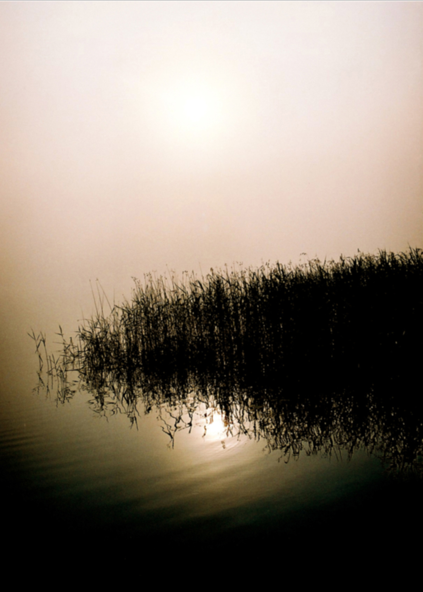 Mazury, wschód słońca nad jeziorem, podróże rowerem, fotografia Monika Turska
